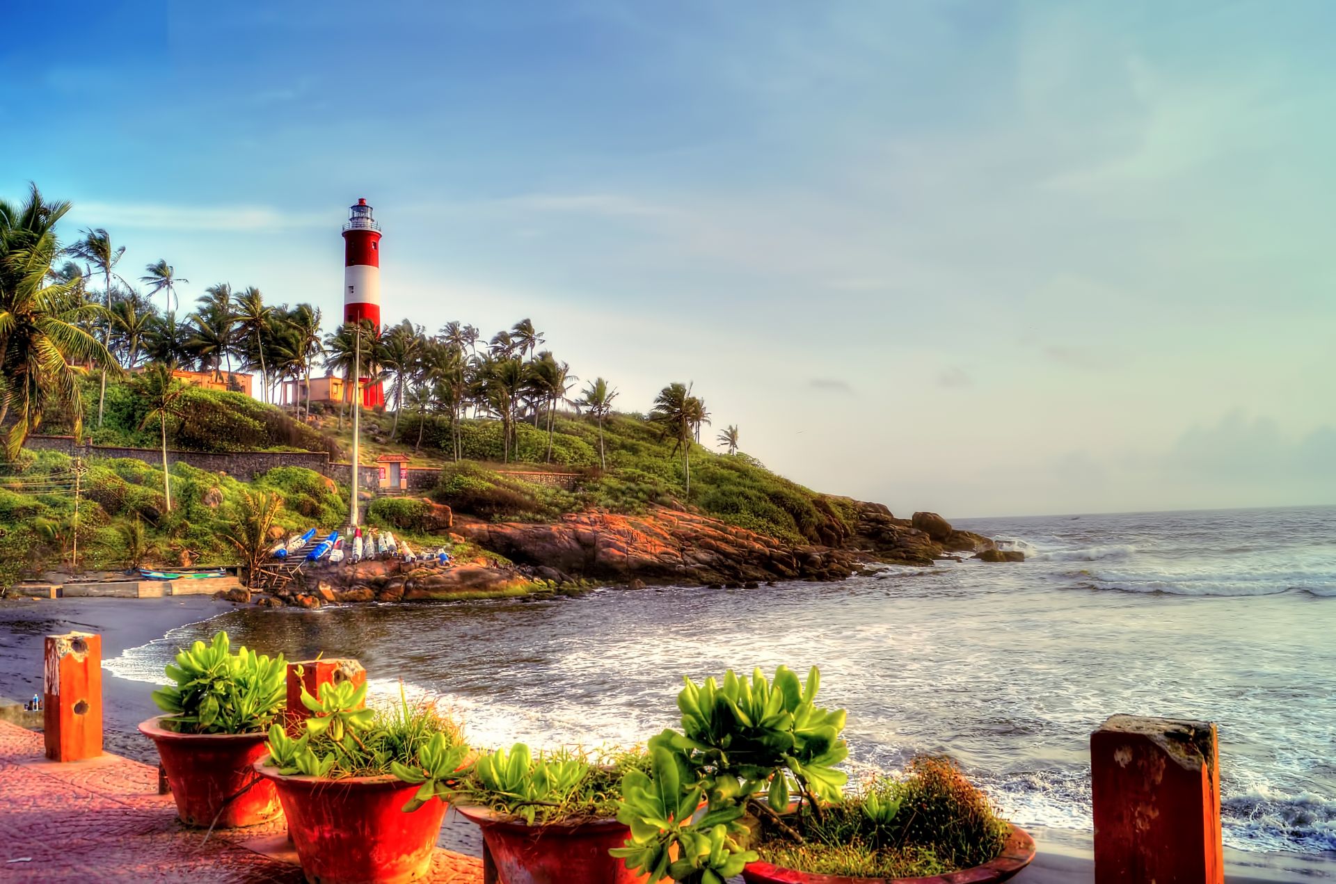 The picturesque location of the lighthouse on the popular Kovalam beach