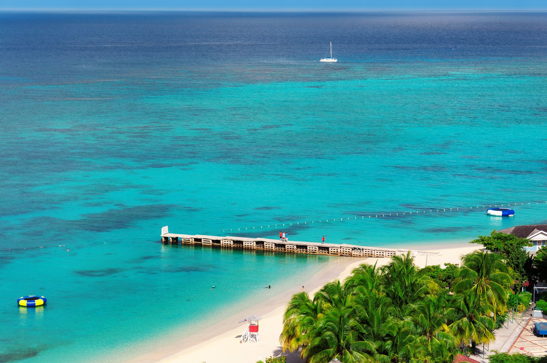 Aerial view of beautiful Caribbean beach and pier