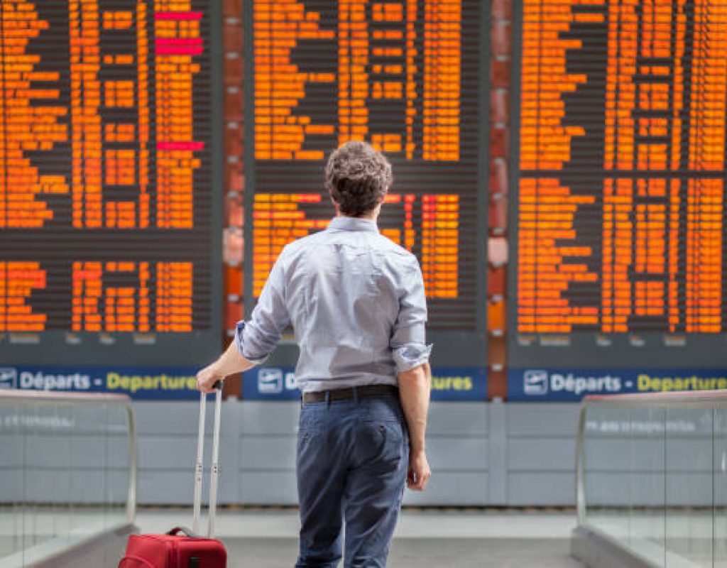 travel with international flight, person passenger waiting in airport departure terminal